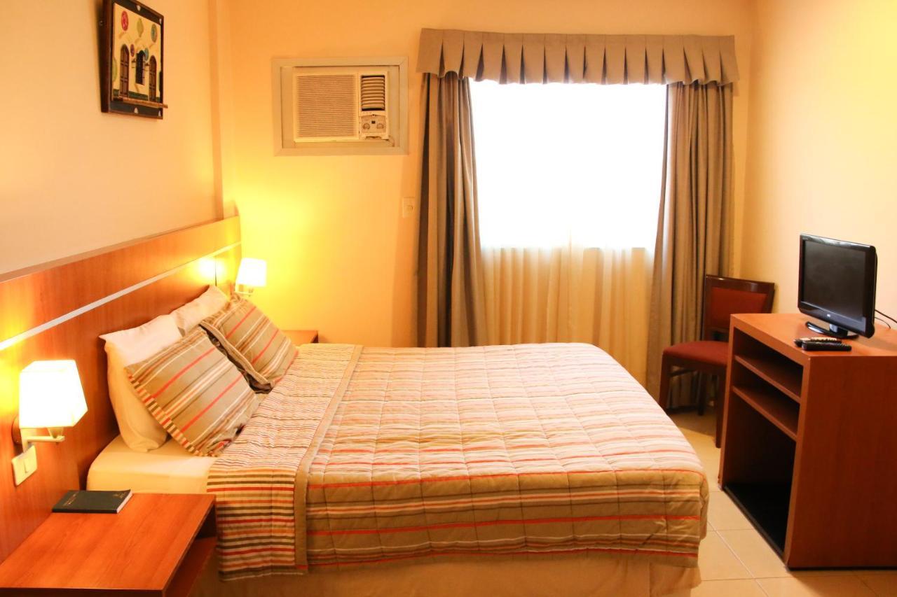 Olimpo Hotel & Suites Itaugua Exterior photo